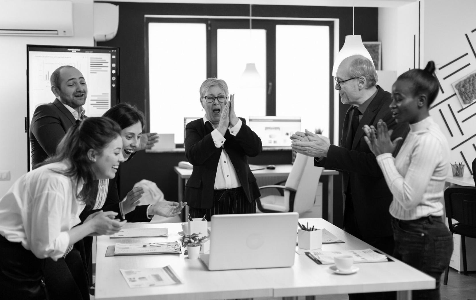 Business team collaborating on strategic presentation development